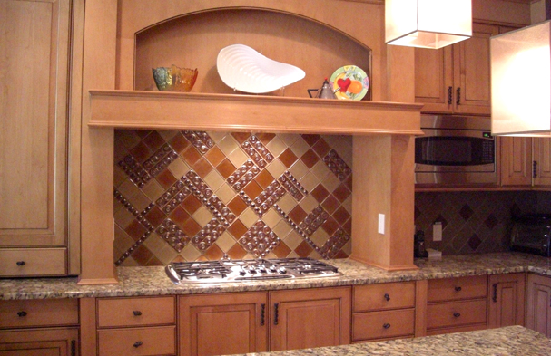 This photo features a Vienese inspired backsplash pattern from the early 20th century made of all glass.